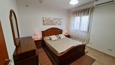 Letto o letti in una camera di Villa Vivi. Piscina, idro, giardino e condizionatore