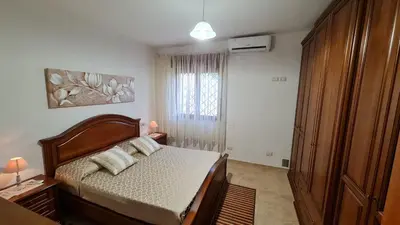 Letto o letti in una camera di Villa Vivi. Piscina, idro, giardino e condizionatore