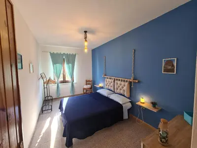 Letto o letti in una camera di A ca' di Pe e Giò