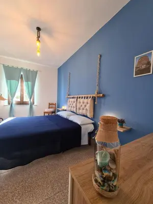 Letto o letti in una camera di A ca' di Pe e Giò