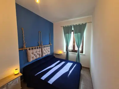 Letto o letti in una camera di A ca' di Pe e Giò