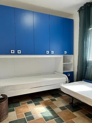 Letto o letti in una camera di Attico Le Vele con vista mare - Nebida