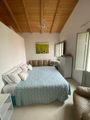 Letto o letti in una camera di Casa Opera