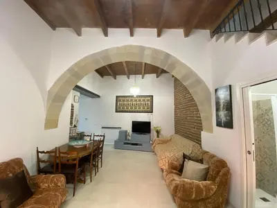 Area soggiorno di Casa Opera