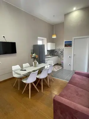TV o dispositivi per l'intrattenimento presso APPARTAMENTO SUITE SARDINIA HOLIDAY