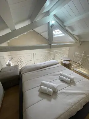 Letto o letti in una camera di APPARTAMENTO SUITE SARDINIA HOLIDAY