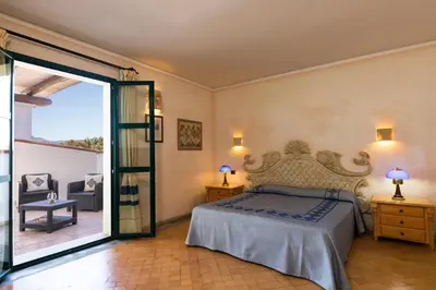 Letto o letti in una camera di Hotel Poseidonia
