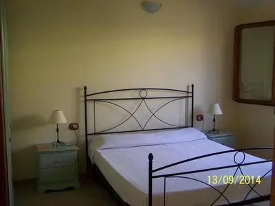 Letto o letti in una camera di Villa Julia