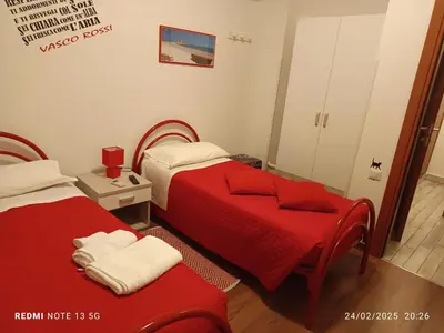 Letto o letti in una camera di La fontanella