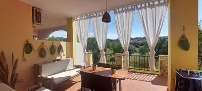 Balcone o terrazza di Dimora Pintau in residence con piscina privata