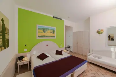 Letto o letti in una camera di Hotel Stella Maris