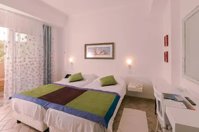 Letto o letti in una camera di Hotel Stella Maris