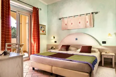 Letto o letti in una camera di Hotel Stella Maris