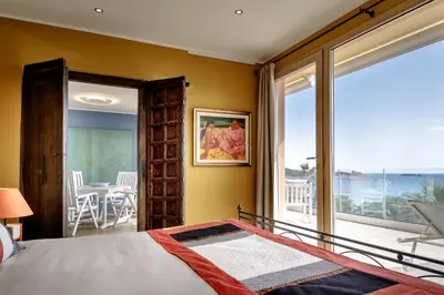 Letto o letti in una camera di Hotel Stella Maris