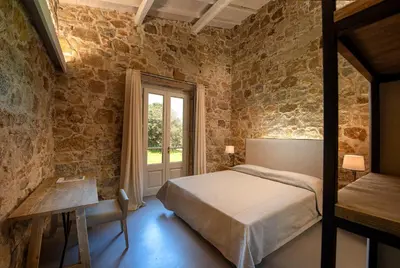 Letto o letti in una camera di Villa Morisca