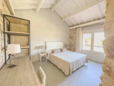 Letto o letti in una camera di Villa Morisca