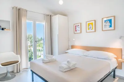 Letto o letti in una camera di Villa Gio' - 200 mt from the beach - AC
