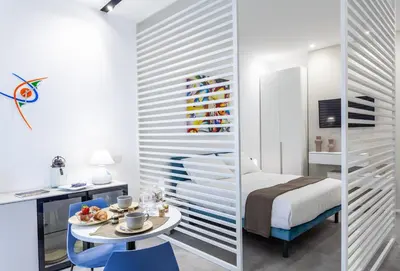Letto o letti in una camera di corte23 suite