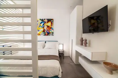 Letto o letti in una camera di corte23 suite