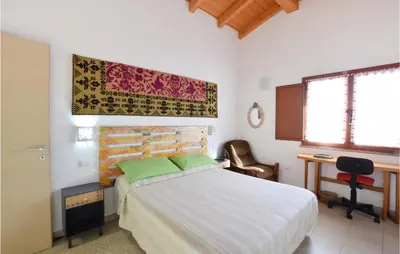 Letto o letti in una camera di Amazing Apartment In Riola Sardo