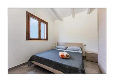Letto o letti in una camera di Da Dani