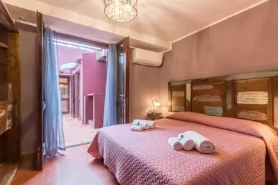 Letto o letti in una camera di Villa con grande giardino ad 800 mt dal mare