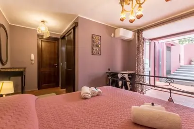 Letto o letti in una camera di Villa con grande giardino ad 800 mt dal mare