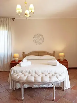 Letto o letti in una camera di Casa Azzurra