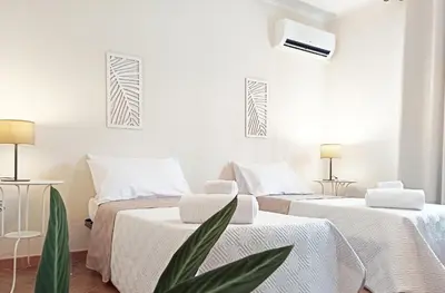 Letto o letti in una camera di Casa Azzurra