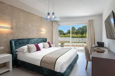 Letto o letti in una camera di Villa Escargot Luxury in Costa Rei Beach
