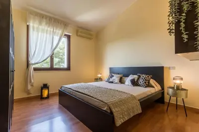 Letto o letti in una camera di TARA
