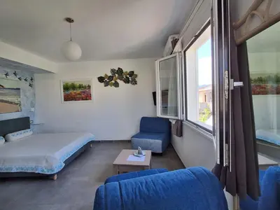 Letto o letti in una camera di B&B da Nuccia Villasimius
