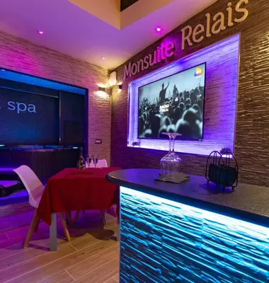 TV o dispositivi per l'intrattenimento presso Monsuite Relais 3 - Black Suite