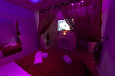 Letto o letti in una camera di Monsuite Relais 3 - Black Suite