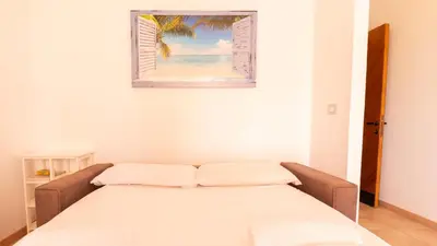 Letto o letti in una camera di A due passi dal Mare nel Sinis-Beachside Haven