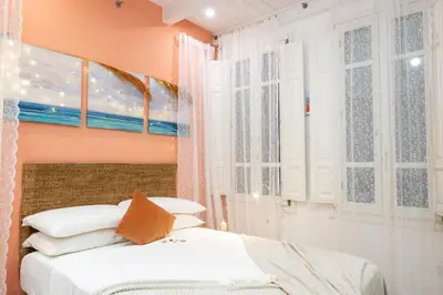 Letto o letti in una camera di ZenFlamingo Mini Monolocale - Only adults