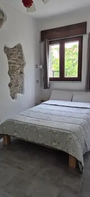 Letto o letti in una camera di Da Lisa