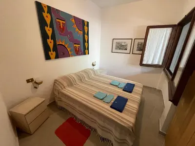 Letto o letti in una camera di Casa Bouganville Pinus Village