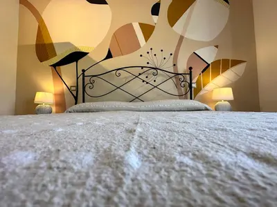 Letto o letti in una camera di Villa Lotty a 5 minuti a piedi dal mare