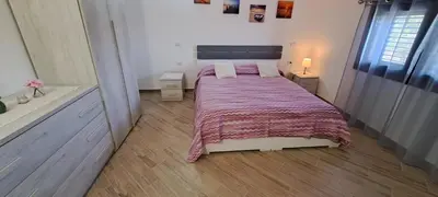 Letto o letti in una camera di Casa Terra Del Sole