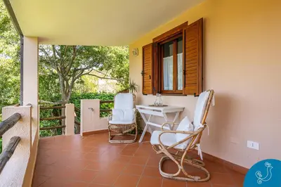 Balcone o terrazza di La Bouganville - House with garden and sea view