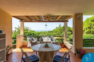 Balcone o terrazza di La Bouganville - House with garden and sea view