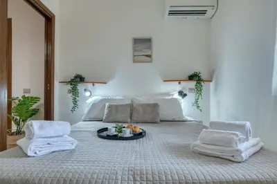 Letto o letti in una camera di IzzHome Escape 2