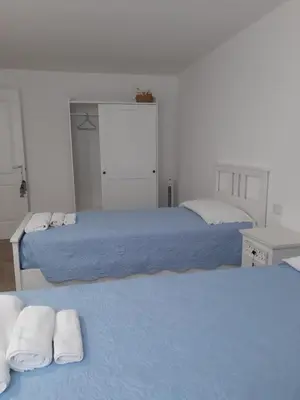 Letto o letti in una camera di Villa Diletta