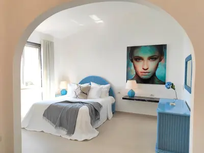 Letto o letti in una camera di Villa Bella