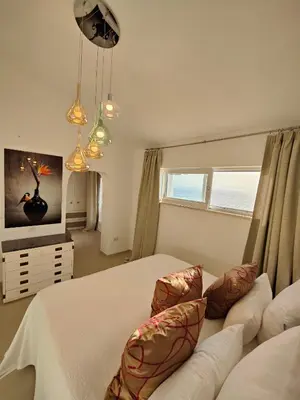Letto o letti in una camera di Villa Bella