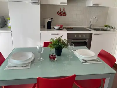 Cucina o angolo cottura di ROSSINI Apartment Parking