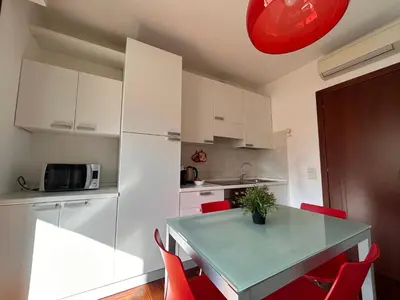 Cucina o angolo cottura di ROSSINI Apartment Parking