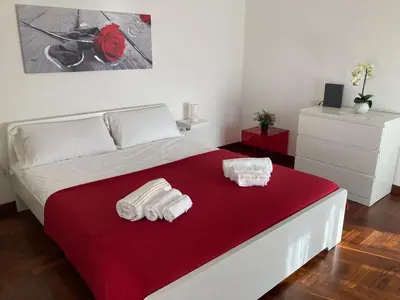Letto o letti in una camera di ROSSINI Apartment Parking
