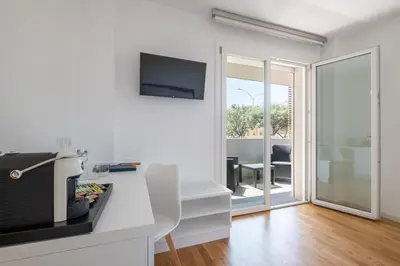 TV o dispositivi per l'intrattenimento presso Helios Guest House